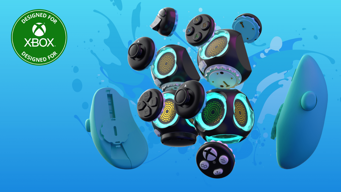 A break-down of the components of the newly-announced Proteus Controller. Four cubes, with detachable buttons and faces. Set on a blue background.